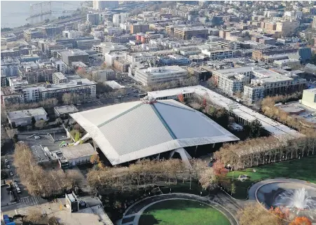  ??  ?? The sloped roof of KeyArena at the Seattle Center is seen from above on Monday afternoon.