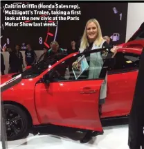  ??  ?? Caitrin Griffin (Honda Sales rep), McElligott’s Tralee, taking a first look at the new civic at the Paris Motor Show last week.