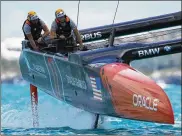  ?? CLIVE MASON / GETTY IMAGES ?? Oracle Team USA could not salvage a split in Saturday’s competitio­n, as its catamaran faltered in the second race against Team New Zealand.