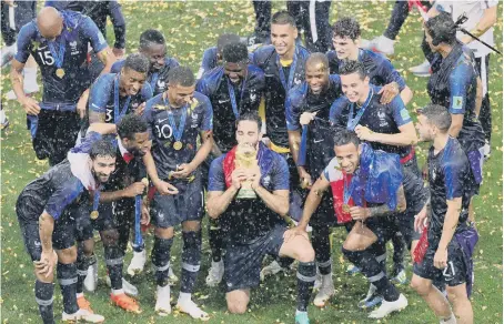  ??  ?? France celebrate winning the FA Cup by beating Croatia 4-2 in Moscow yesterday.