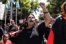  ?? Photograph: Diego Fedele/EPA ?? Protestors rally in Melbourne. Australia Day has been a national public holiday only since 1994.