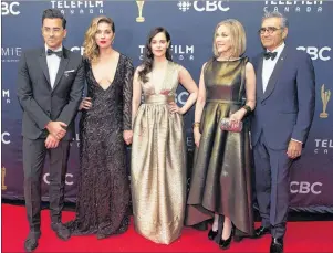  ?? CP PHOTO ?? The cast of “Schitts Creek,” (left to right) Dan Levy, Annie Murphy, Emily Hampshire, Catherine O’Hara and Eugene Levy arrive on red carpet at the Canadian Screen Awards in Toronto on Sunday, March 11, 2018.