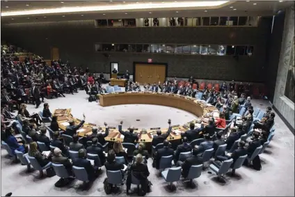  ??  ?? In this Monday photo, the Security Council votes on a resolution concerning Jerusalem’s status at United Nations headquarte­rs. The United States on Monday vetoed a resolution supported by the 14 other U.N. Security Council members that would have...