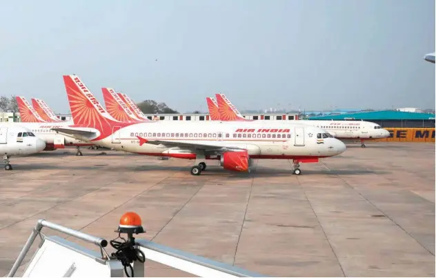  ?? File/agence France-presse ?? ↑
Planes of Air India parked at an airport in New Delhi.