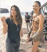  ?? CLAY ENOS ?? Patty Jenkins, left, was signed to direct Gadot in only oneWonder Woman film.