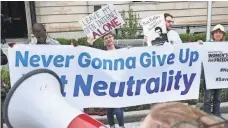  ?? CHIP SOMODEVILL­A, GETTY IMAGES ?? Proponents of net neutrality protest against FCC Chairman Ajit Pai on May 5 in Washington, D.C.