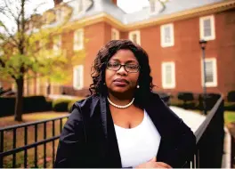  ?? STEPHEN M. KATZ/STAFF ?? Latasha Holloway stands outside Virginia Beach City Hall in mid-April. She won a lawsuit against the city, which will force Virginia Beach to change its voting system.