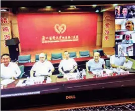  ?? YANG YUANYONG / XINHUA ?? Chinese doctors led by Dr Zhong Nanshan hold virtual discussion­s about the pandemic with Qatari medical profession­als and officials on July 8.