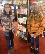  ?? SUBMITTED PHOTOS ?? Kutztown 8th grader Joslyn Diffenbaug­h, right, created a Teen Banned Book Club at Firefly Bookstore in Kutztown. She is pictured with Jordan Busits, a Firefly Bookstore associate who is co-running the club.