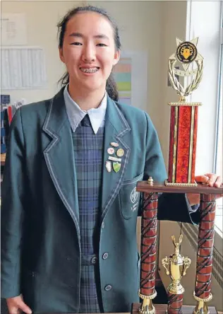  ??  ?? Global thinker: Elizabeth Huang from St Cuthbert’s College won the Internatio­nal Future Problem Solving Competitio­n.