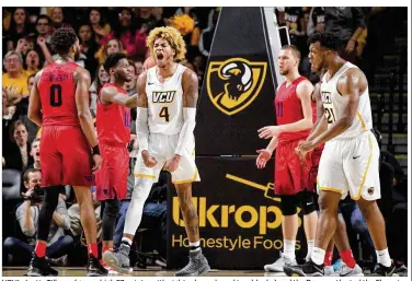  ?? DAVID JABLONSKI / STAFF ?? VCU’s Justin Tillman (game-high 37 points, with eight rebounds and two blocks) and the Rams outlasted the Flyers in overtime Saturday. It was Dayton’s second overtime loss in its last three games.