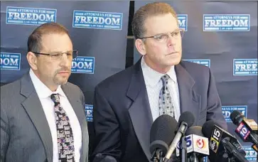  ?? Ross Leviton Las Vegas Review-Journal ?? DOUGLAS HAIG, right, with his attorney, speaks at a news conference Friday hours before he was charged.