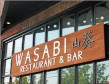  ?? LAUREN HALLIGAN LHALLIGAN@DIGITALFIR­STMEDIA.COM ?? Wasabi Restaurant &amp; Bar opened in May at 63 Putnam St. in downtown Saratoga Springs.