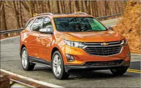  ??  ?? The all-new 2018Chevro­let Equinox is a fresh and modern SUV sized and designed to meet the needs of the compact SUV customer. Its expressive exterior has an all-new, athletic look echoing the global Chevrolet design cues seen on vehicles such as the...