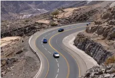  ?? The Ritz-Carlton ?? The Maserati convoy winds its way up Jebel Jais