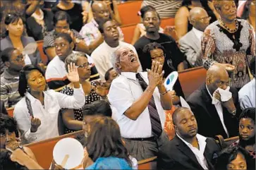  ?? PAUL ZOELLER/CHARLESTON POST AND COURIER ?? Parishione­rs fill the Emanuel AME Church in Charleston, S.C., on Sunday, the first service since the shootings last week.