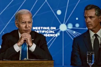  ?? Andrew Caballero-Reynolds/AFP/TNS ?? President Joe Biden and Gov. Gavin Newsom take part in an event discussing regulation of artificial intelligen­ce in June at the Fairmont Hotel in San Francisco.