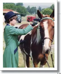  ??  ?? TREASURE: Teenaged Hope EllisAshbu­rn puts some finishing touches on her pony, Munchkin, at a local horse show during the 1980s.