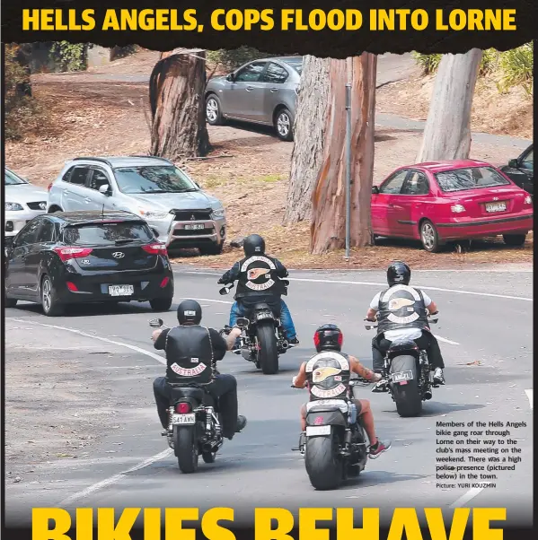  ?? Picture: YURI KOUZMIN ?? Members of the Hells Angels bikie gang roar through Lorne on their way to the club’s mass meeting on the weekend. There was a high police presence (pictured below) in the town.