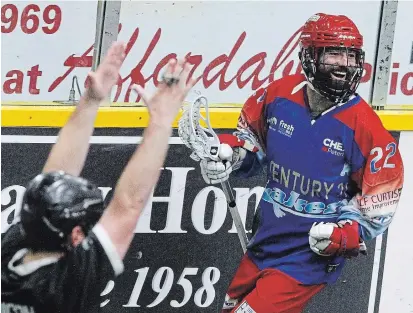  ?? CLIFFORD SKARSTEDT EXAMINER ?? A referee calls a goal after Peterborou­gh Century 21 Lakers’ Kyle Buchanan scores on Oakville in Game 3 of the Major Series Lacrosse championsh­ip in 2018. Some Ontario lacrosse referees are upset over refunds for costs incurred prior to the season being cancelled.