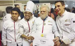  ??  ?? Coupe du Monde president and founder Gabriel Paillasson (third from left) awards the ‘Ticket to Lyon’ to the Shangri- La Makati team members (from left) Bryan Dimayuga, Rizalino Mañas and executive pastry chef Romaine Renard.