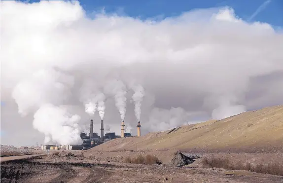  ?? JON AUSTRIA/FARMINGTON DAILY TIMES ?? Two of the four units at the San Juan Generating Station were shut down just before the Christmas holiday. It’s a first step in Public Service Company of New Mexico’s plan to completely shutter the 50-year-old coal-fired facility by 2022.