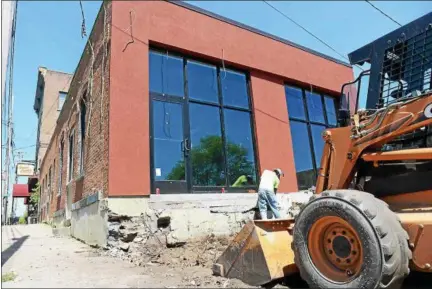  ?? TANIA BARRICKLO — DAILY FREEMAN ?? Exterior work continues on the extension at Frank Guido’s Little Italy on Thomas Street in Midtown Kingston, N.Y.