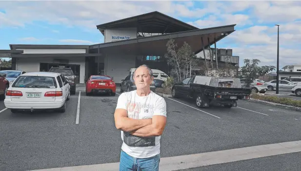  ??  ?? FED UP: Tavern owner Peter Sayers is furious after a decision which allows unrestrict­ed use of 64 of 69 their car parks by boaties using the marina. Picture: JUSTIN BRIERTY