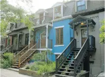  ?? ROBERT J. GALBRAITH, MONTREAL GAZETTE FILES ?? Little Burgundy’s residentia­l area includes these duplexes on Coursol St.