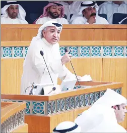  ??  ?? In a file photo taken on March 1, 2016, Kuwaiti Shiite MP Abdulhamee­d Dashti speaks during a Parliament session at Kuwait’s National Assembly in Kuwait City. A Kuwaiti court on July 27, sentenced the Shiite lawmaker to 14 years and six months in...