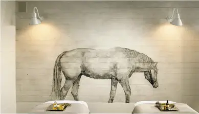  ?? Cesar Rubio ?? In the spa, artist Tina Wainwright painted horses on the walls, a nod to the inn’s equestrian theme.