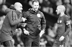  ??  ?? Manchester City’s Spanish manager Pep Guardiola (left) gestures to midfielder David Silva (right) during the English Premier League football match against West Bromwich Albion at The Hawthorns stadium in West Bromwich, central England in this Oct 28...