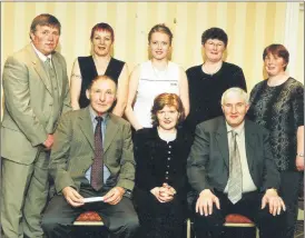  ?? ?? At the social of the Ballyporee­n hurling, juvenile and ladies football clubs in 2002 were, sitting l-r: Tom Hickey (chairman), Mary Shinnick (treasurer county board) and Liam Shinnick (chairman county board); Back l-r: Tom Feeney (committee member), Rose Kelly (trainer), Mary Hyland (PRO), Bridie Martin (treasurer) and Josephine Meaney (secretary).