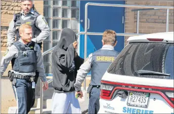  ?? SUEANN MUSICK/THE NEWS ?? Jason David Bezanson is led out of the Pictou Provincial Courthouse on Monday, Sept. 10. He was charged with murdering a co-worker at the Travel Lodge in New Glasgow.