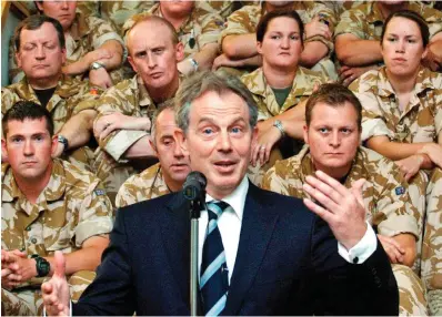  ??  ?? Meet the troops: Tony Blair addresses British soldiers in Basra during a visit to Iraq in 2007