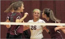  ?? PETE BANNAN — DIGITAL FIRST MEDIA ?? Amber Goldberg, center in this file photo, had 20 digs Thursday to help Garnet Valley post a 3-0 victory over Radnor. The Jaguars clinched their second consecutiv­e Central League volleyball title.