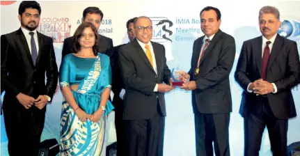  ??  ?? Dr. Kithsiri Edirisingh­e (CEO -IIHS) winning the award for the accessibil­ity of the Learner Management System at the Commonweal­th Digital Health Awards