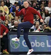  ?? ANDY CROSS — THE DENVER POST ?? Nuggets head coach Michael Malone gets animated in the third quarter against the Wizards at Ball Arena in Denver on Thursday.