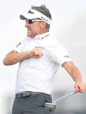  ?? Picture: Getty. ?? Ian Poulter beats his chest after holing a long putt at the 18th to earn a play-off with Beau Hossler.