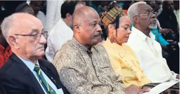  ?? JERMAINE BARNABY/FREELANCE PHOTOGRAPH­ER ?? From left: Mike Fennell, former president of the Jamaica Olympic Associatio­n; Sir Hilary Beckles, University of the West Indies (UWI) vice-chancellor; Lady Beckles and former prime minister of Jamaica, P.J. Patterson, at the launch of the UWI’s Faculty...