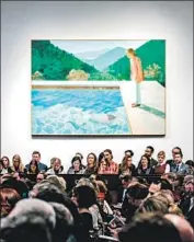  ?? Alba Vigaray EPA/Shuttersto­ck ?? DAVID HOCKNEY’S 1972 painting “Portrait of an Artist (Pool with Two Figures)” sold for $90.3 million, obliterati­ng the auction record for a living artist.