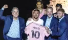  ?? Photograph: Cristóbal Herrera/ EPA ?? Inter Miami’s owners, including David Beckham and Jorge Mas, celebrate the signing of Messi.