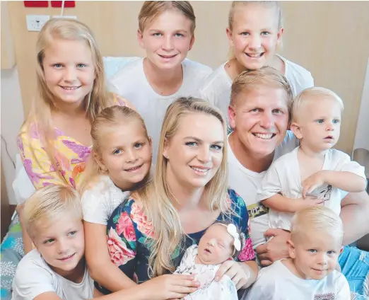 ?? Picture: GLENN HAMPSON ?? Ben and Emma Hannant, with children Kye, 14, Ella, 12, Mia, 10, Brax, 8, Ava, 6, Channing, 4, and Koa, 2, gathered at John Flynn Hospital at Tugun to welcome the latest member of the family, a baby girl named Pippa.