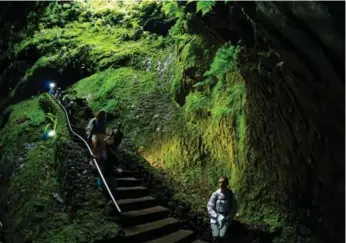  ?? EDUARD OCOSTA ?? Inside the magmatic chamber of the Algar do Carvão volcano on Terceira Island in the Portuguese Azores.