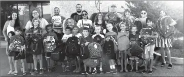  ??  ?? Students from Albert Einstein Elementary School about to deliver the backpacks they collected to benefit clients of Help the Children and families of SCV veterans.