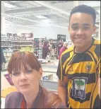  ??  ?? Hinckley Rugby Club Under 15 team player Joshua Babbs joined Sainsbury’s checkout operator Sally-Ann Corrigan