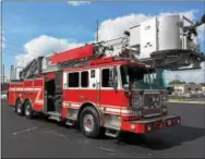  ?? SUBMITTED PHOTO ?? Kimberton Fire Company is in the final stages of obtaining a new tower apparatus. Shown here is the new tower apparatus, during a recent inspection. To recognize the occasion and to raise some money for the department, Iron Hill Brewery & Restaurant in...