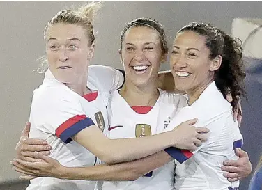  ?? AP ?? THE US’s Carli Lloyd (center) celebrates her goal against Costa Rica with Emily Sonnett (left) and Christen Press.