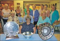  ??  ?? Fort William Institute members with their federation trophies.