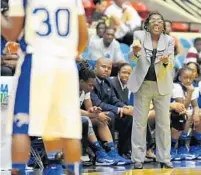  ?? JIM RASSOL/STAFF FILE PHOTO ?? Dillard head coach Marcia Pinder keeps an eye on her team during the game against Bartram Trail in the 2012-13 FHSAA Girls basketball Championsh­ips Class 5A semifinal.